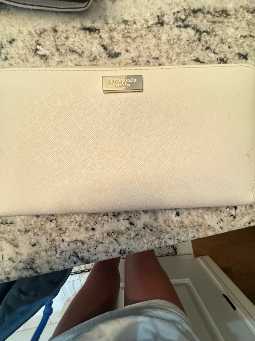 kate spade Cream Saffiano Zip Wallet with Gold Logo Plaque
